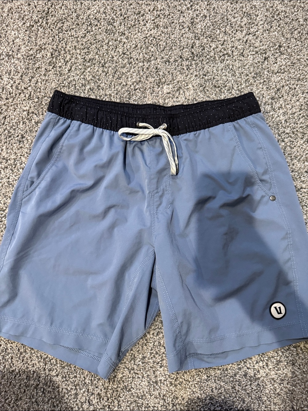 Light Blue Men’s Vuori training shorts